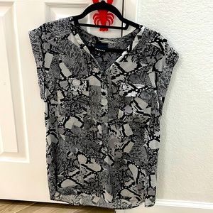 Trouvé short sleeve snakeskin print top. Size Medium. Great condition.